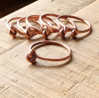 Copper or brass knot brass rings