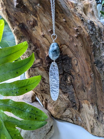 Hammered silver and porcelain pendant