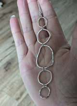 Long multi hoop pendant