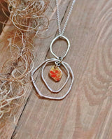 Hammered hoop pendant with enamel center.  (three variations)