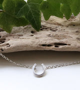 Horseshoe pendant necklace