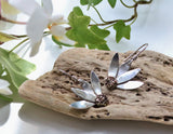Blowing in the wind daisy earrings