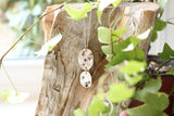 Hammered disc pendant with copper dots