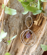 Hammered hoop pendant with enamel center.  (three variations)