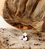 Small sterling silver flower pendant