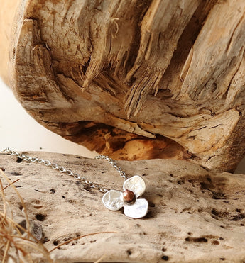 Small sterling silver flower pendant