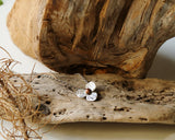Small sterling silver flower pendant