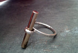 Sterling silver ring, with solid brass rod.