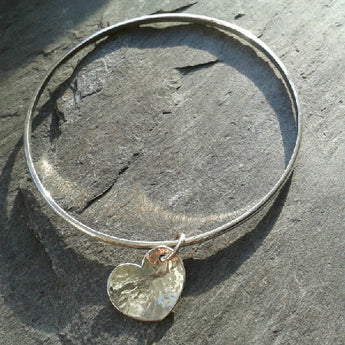 Sterling silver bangle, with hammered heart pendant