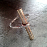 Sterling silver ring, with solid brass rod.