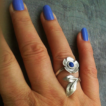 Twisted flower and leaf ring