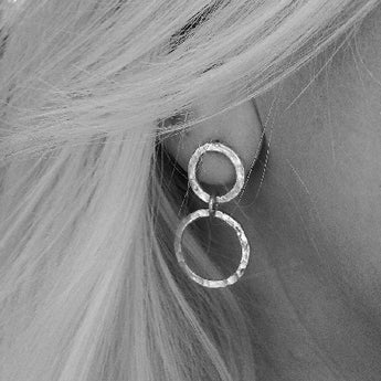Sterling silver double loop earrings.