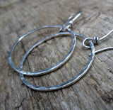 Sterling Silver hammered hoops.