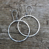 Sterling Silver hammered hoops.