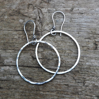 Sterling Silver hammered hoops.