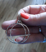 Sterling Silver hammered hoops.